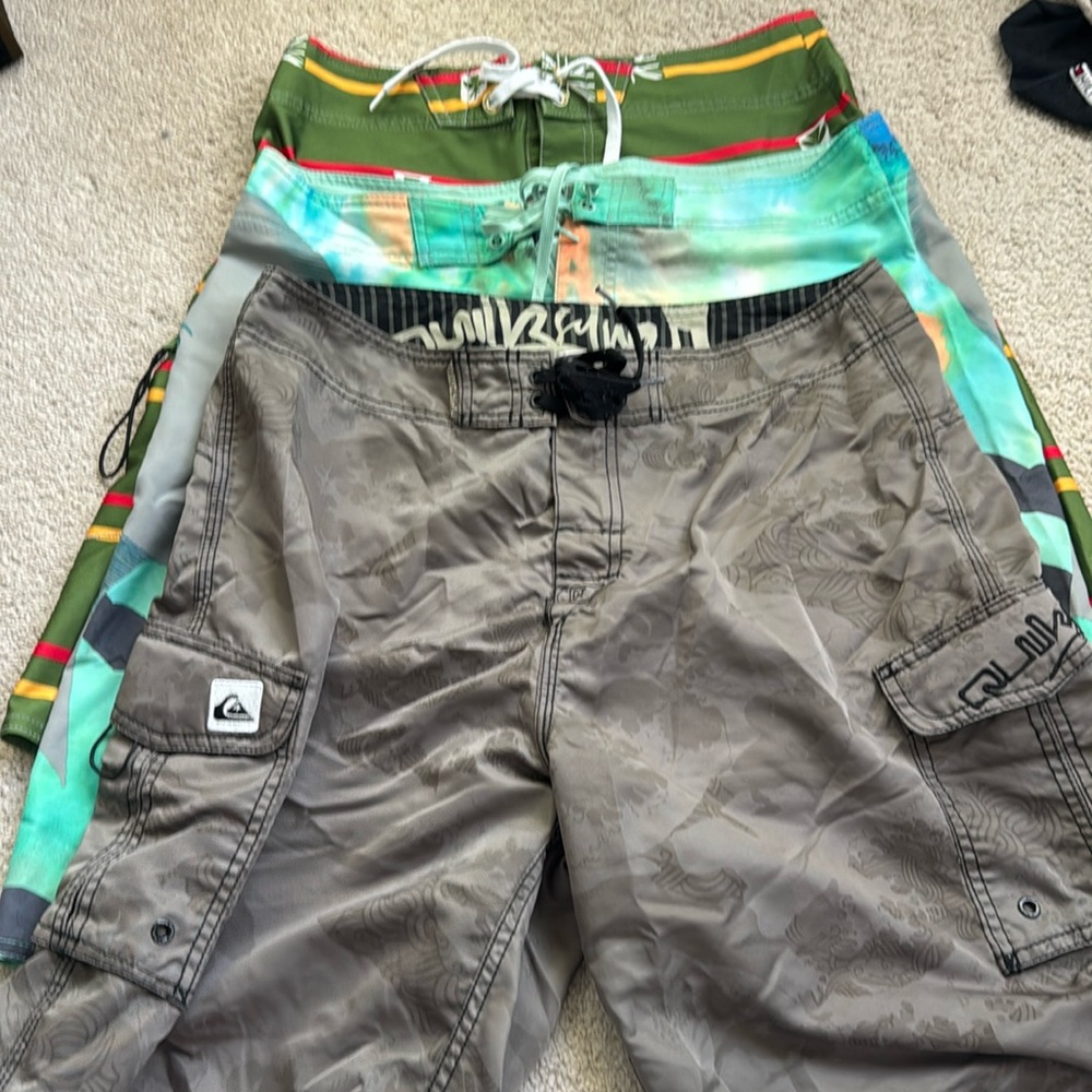 Lot of three board shorts sizes 31 and 32 Quicksilver,RV CA and local motion